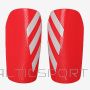 Nagolenniki piłkarskie adidas TIRO SG EU CLB IP3992 / pomarańczowy / L